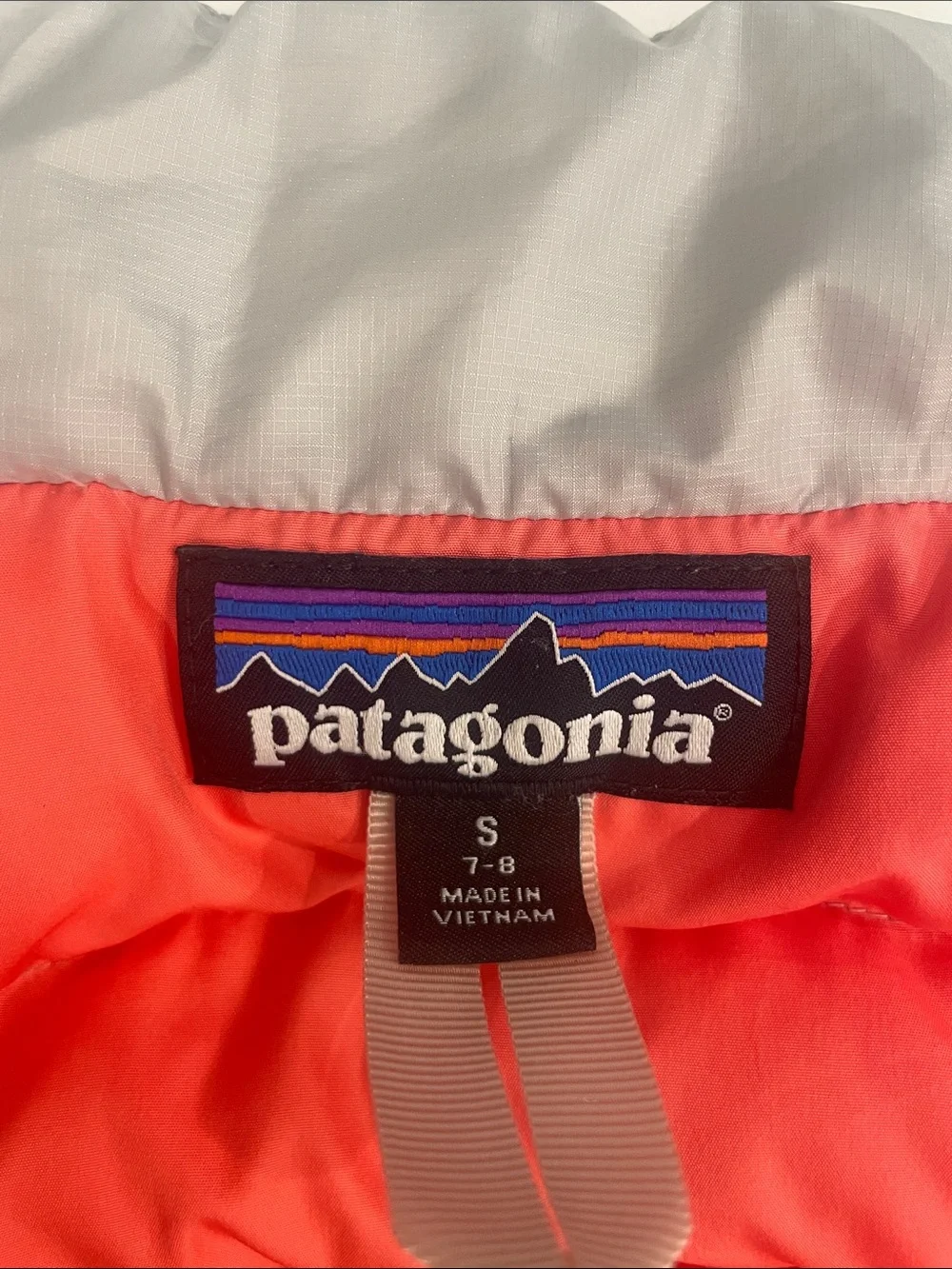 Patagonia Kids Puffer Vest in Light Gray with Coral Interior